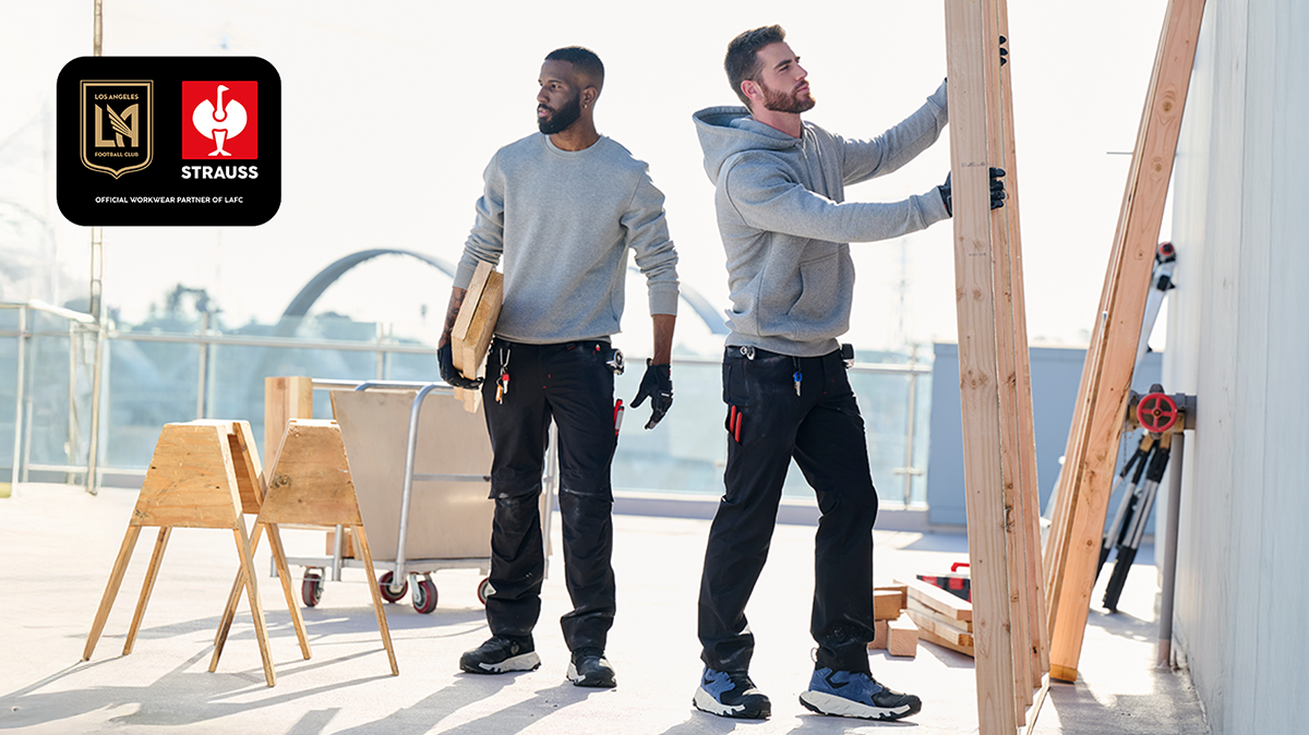 Two contractors work on a roof in STRAUSS workwear