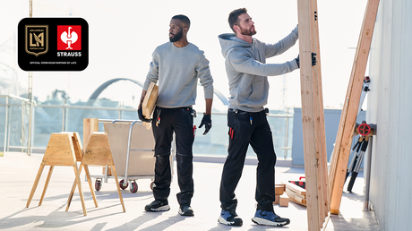 Two contractors work on a roof in STRAUSS workwear
