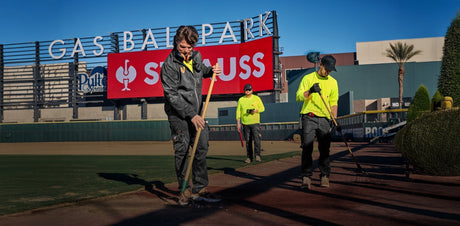 workers with strauss workwear in a baseball ballpark