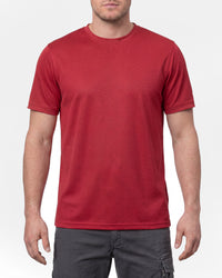 A model wears the STRAUSS Performance T-Shirt in fire red in a studio product scene