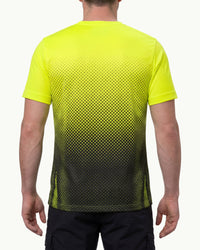 A model wears the STRAUSS Enhanced Visibility Performance T-Shirt e.s.t:aktik in neon yellow and black with black work pants in a high-visibility workwear outfit, showing the shirt fit