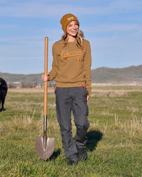 Women's STRAUSS e.s.e:pic artwork crew neck sweatshirt in almond brown, worn in workwear outfit