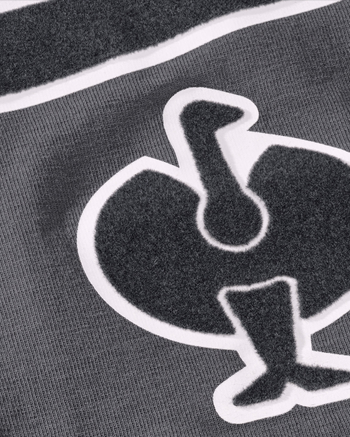 Close-up of the STRAUSS artwork print on the carbon gray Kids' STRAUSS Artwork T-Shirt e.s.e:pic