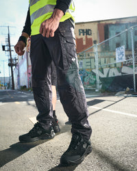 Work Pants e.s.concrete light in black worn in a work setting