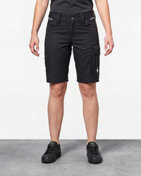 Model wearing Engelbert Strauss women's e.s. concrete light shorts in black, showing the fit, length, waistband, and front pocket layout of the lightweight women’s work shorts with a practical pocket layout.