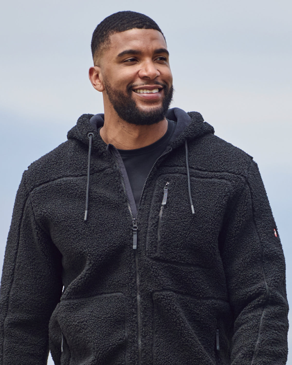 STRAUSS e.s.e:pic hooded sherpa fleece jacket in black paired with workwear