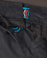 Close-up of chino pocket and waistband on Chino Pants e.s.e:pic in black
