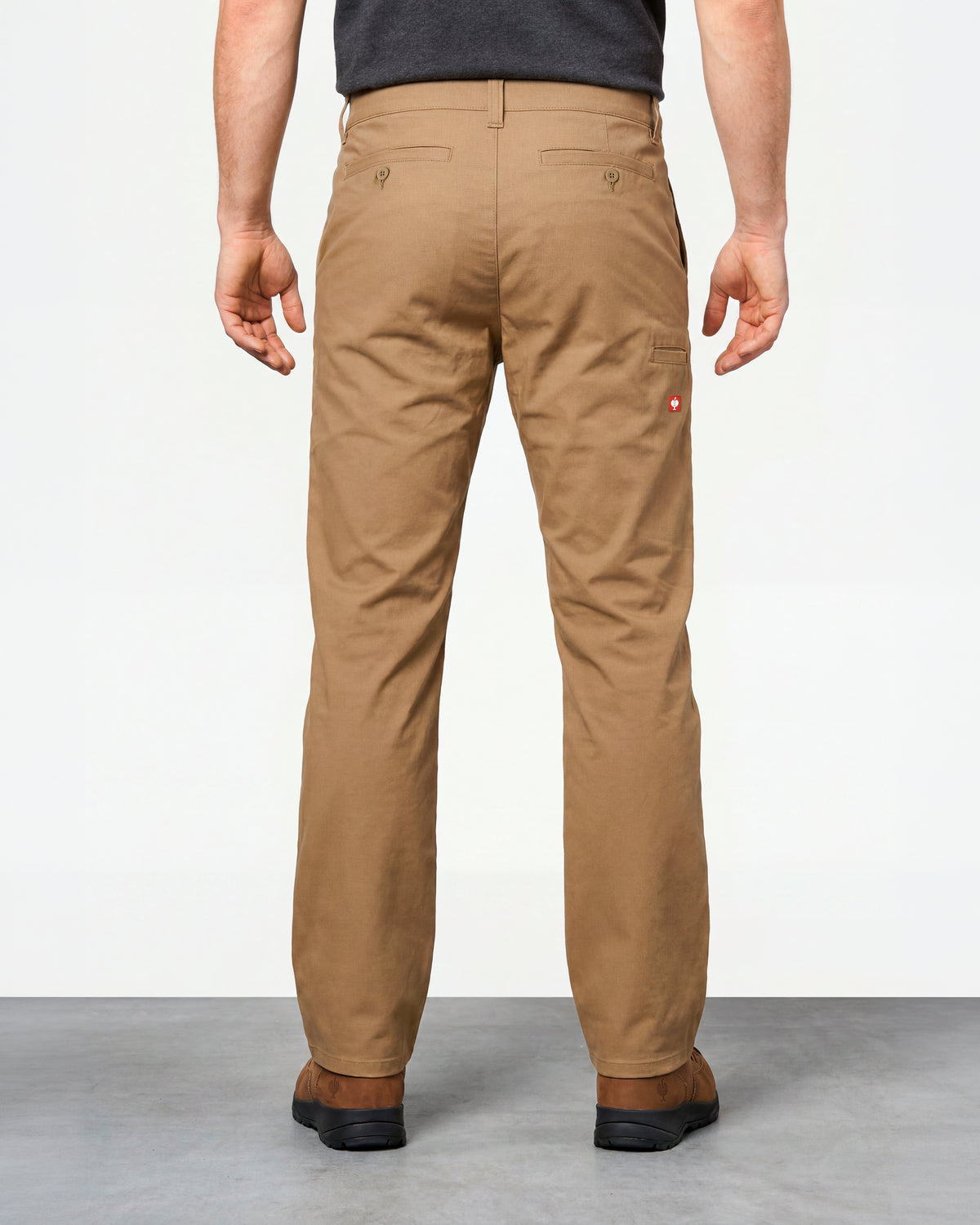 Chino Pants e.s.e:pic in almond brown worn by a model, rear view