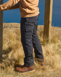 Twill Cargo Work Pants e.s.e:pic in black worn in a work setting