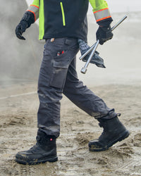 Twill Cargo Work Pants e.s.e:pic in carbon gray worn in a work setting