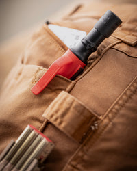 Close-up of cargo pocket details on Twill Cargo Work Pants e.s.e:pic in almond brown