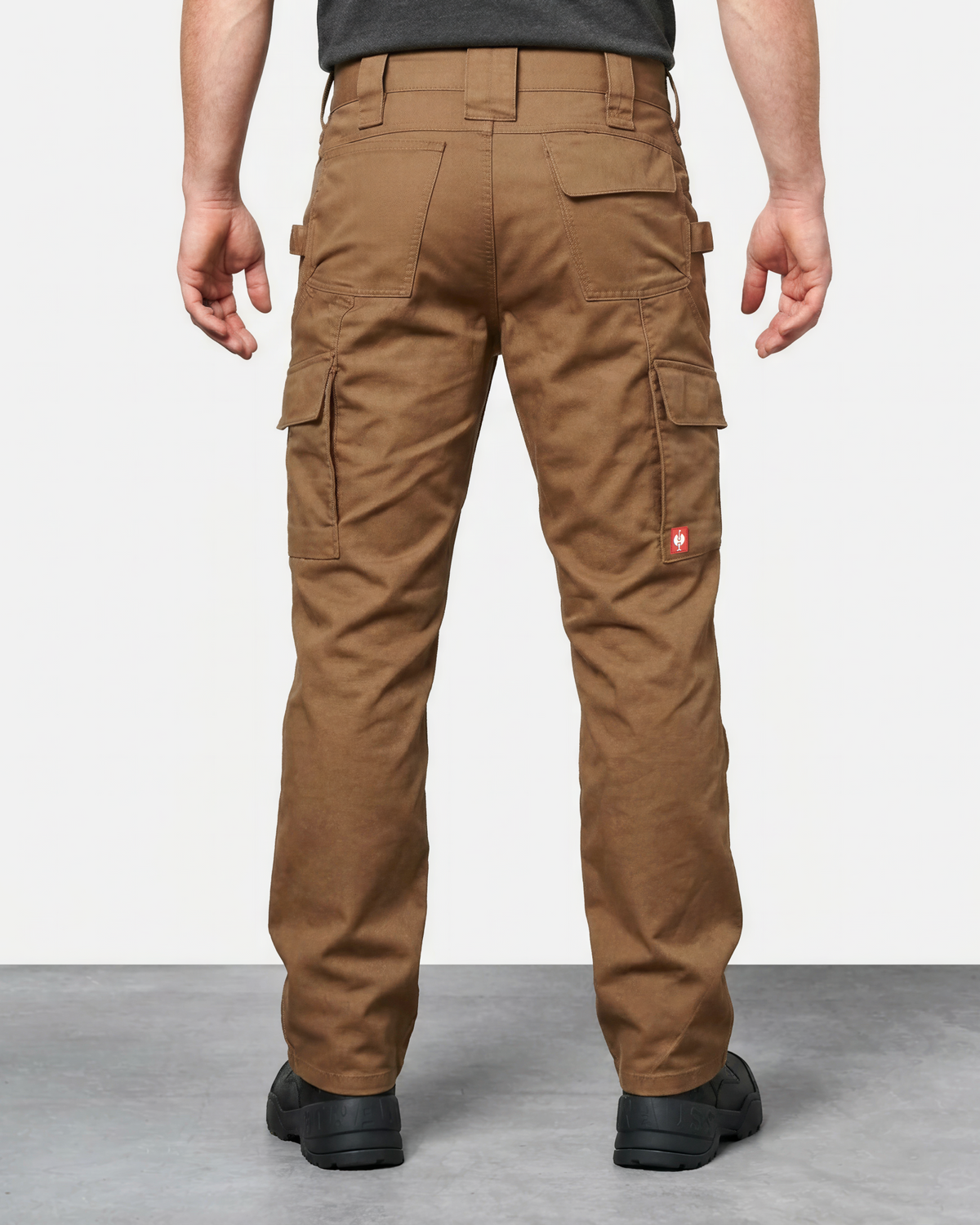 Double Front Twill Cargo Work Pants e.s.e:pic in almond brown worn by a model, rear view