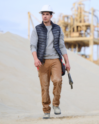 Lifestyle view of Double Front Twill Cargo Work Pants e.s.e:pic in almond brown during work
