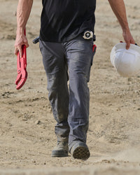 Double Front Ripstop Cargo Work Pants e.s.e:pic in carbon gray worn in a work setting