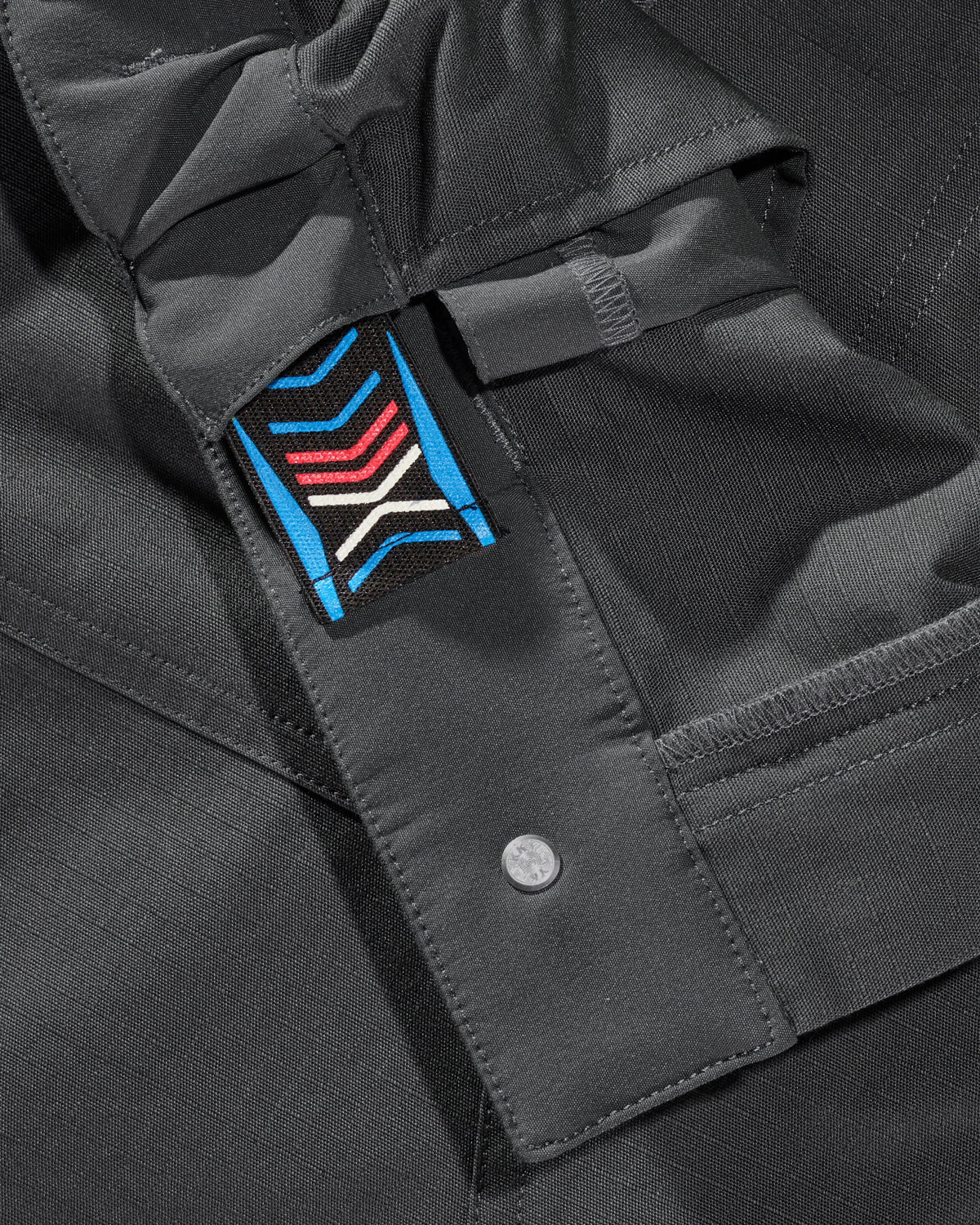 Close-up of reinforced fabric and seams on Double Front Ripstop Cargo Work Pants e.s.e:pic in carbon gray