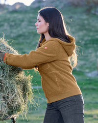 STRAUSS women's e.s.e:pic hooded sherpa fleece jacket in almond brown paired with workwear