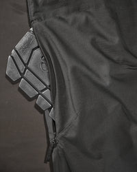 Close-up of knee pad pocket details on Women's Ripstop Cargo Work Pants e.s.e:pic in black