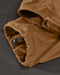 Close-up of adjustable hem pocket details on Stretch Ripstop Cargo Work Pants e.s.taktik in desert brown