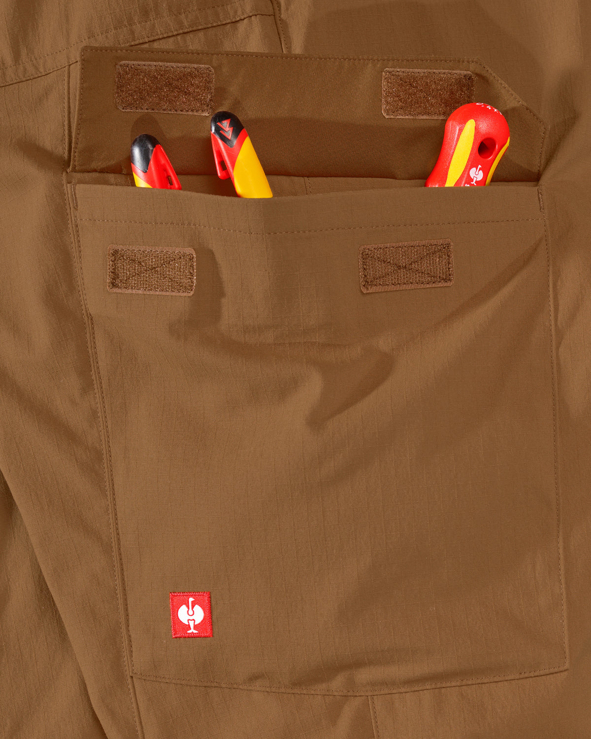 Close-up of reinforced fabric and seams on Stretch Ripstop Cargo Work Pants e.s.taktik in desert brown