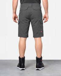 Alternate model view of Engelbert Strauss e.s. taktik stretch ripstop cargo work shorts in carbon gray, showing the side and back fit with visible utility pocket placement and workwear construction.