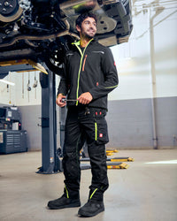 STRAUSS e.s.motion 2020 softshell jacket in black, high-vis yellow, and orange in use on the job