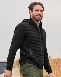 STRAUSS e.s.motion ten hybrid hooded jacket in black in use on the job