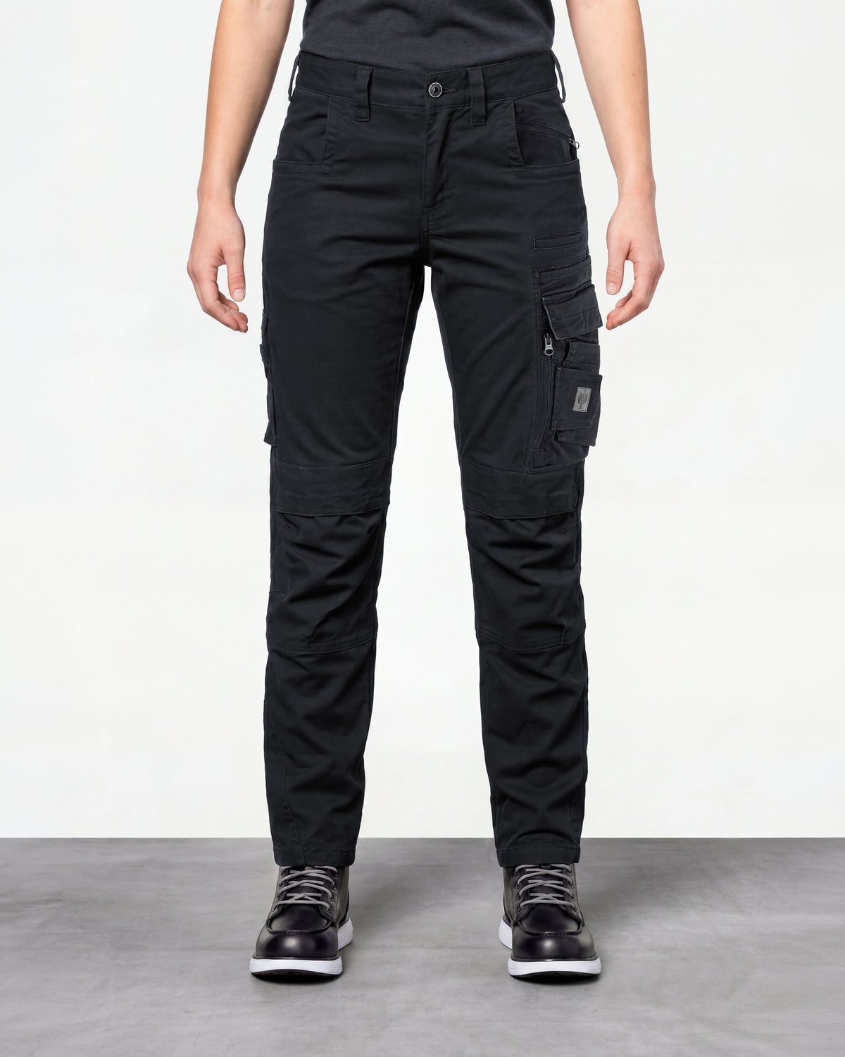 Women's Cargo Work Pants e.s.motion ten in oxid black worn by a model, front view