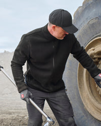 STRAUSS full-zip fleece jacket in black worn in a work setting
