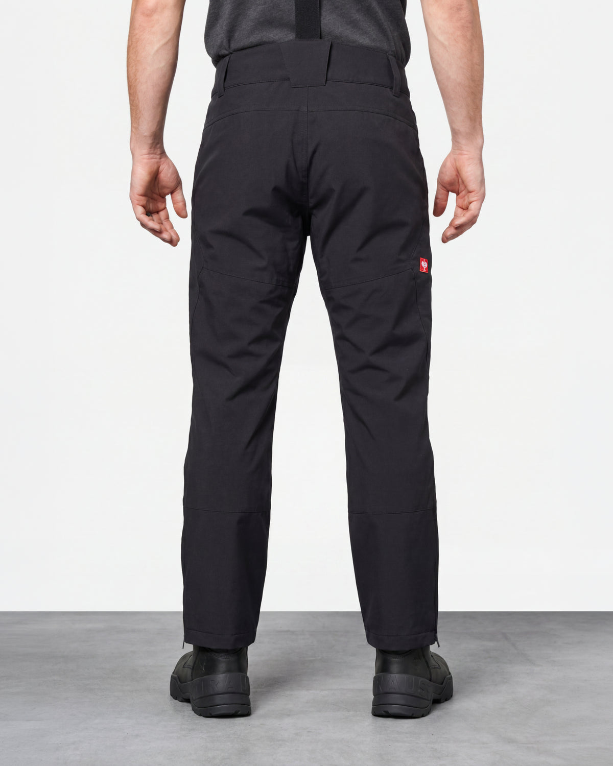 Functional Snow Pants e.s.trail pure in black worn by a model, rear view