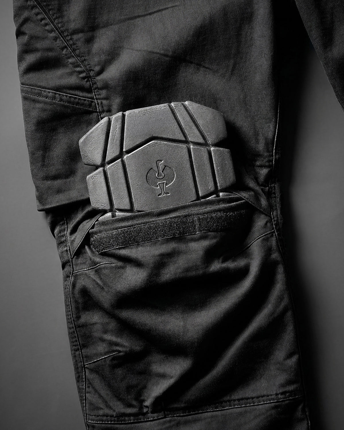 Close-up of the contoured cushioning and flexible shape on the graphite STRAUSS women's ergonomic knee pads.