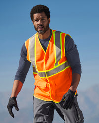 STRAUSS high visibility vest in neon orange worn for high-visibility work