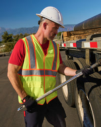 STRAUSS high visibility vest in neon yellow in use with workwear