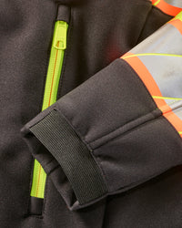 Close-up of zipper and pocket details on STRAUSS Class 2 high visibility softshell jacket in neon yellow and black