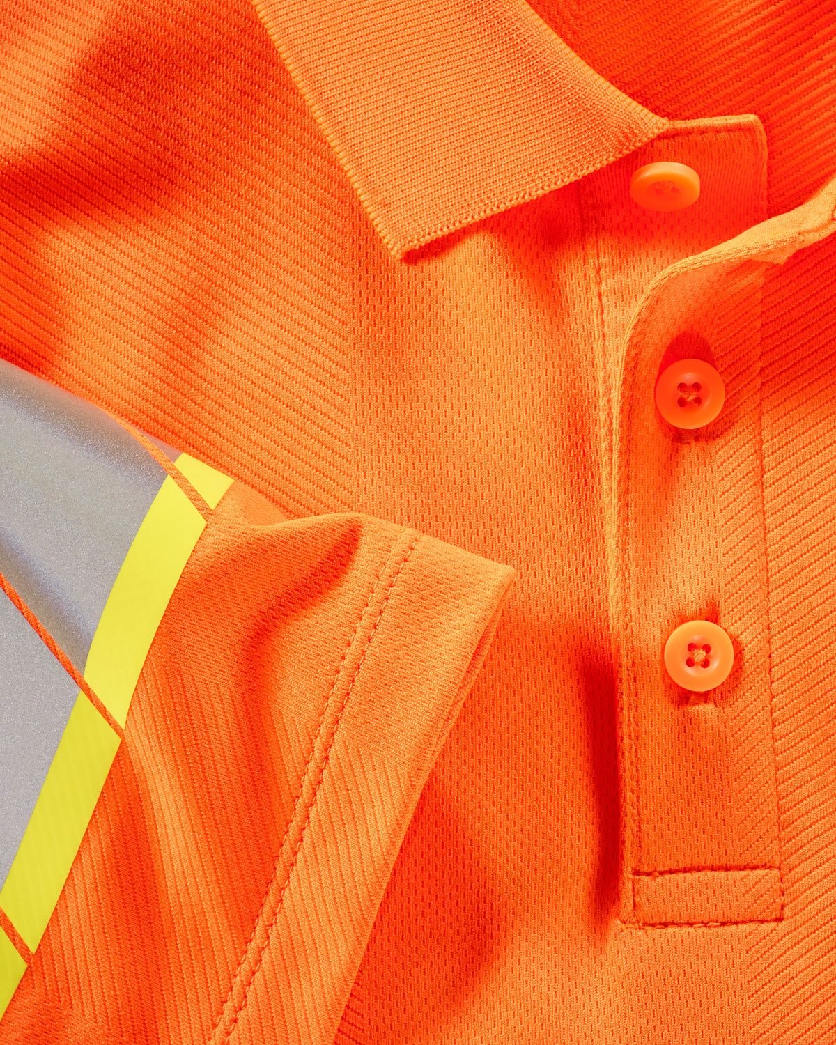 Reflective striping and fluorescent fabric on the STRAUSS Class 2 High Visibility Polo Shirt in neon orange