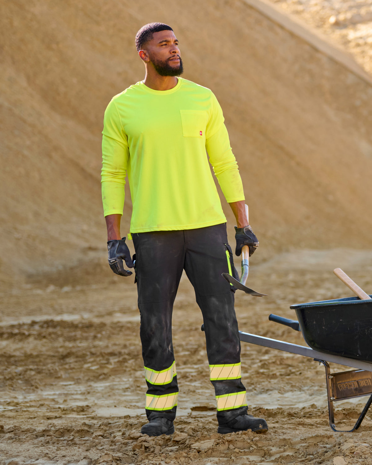 Lifestyle view of Enhanced Visibility Work Pants in black during work
