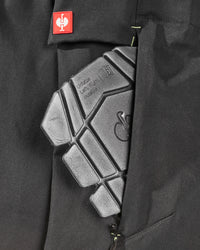Close-up of knee pad pocket on Enhanced Visibility Work Pants in black