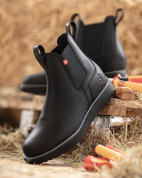 STRAUSS Amarillo 6-inch Soft Toe Chelsea Boot in Black shown in use on the job