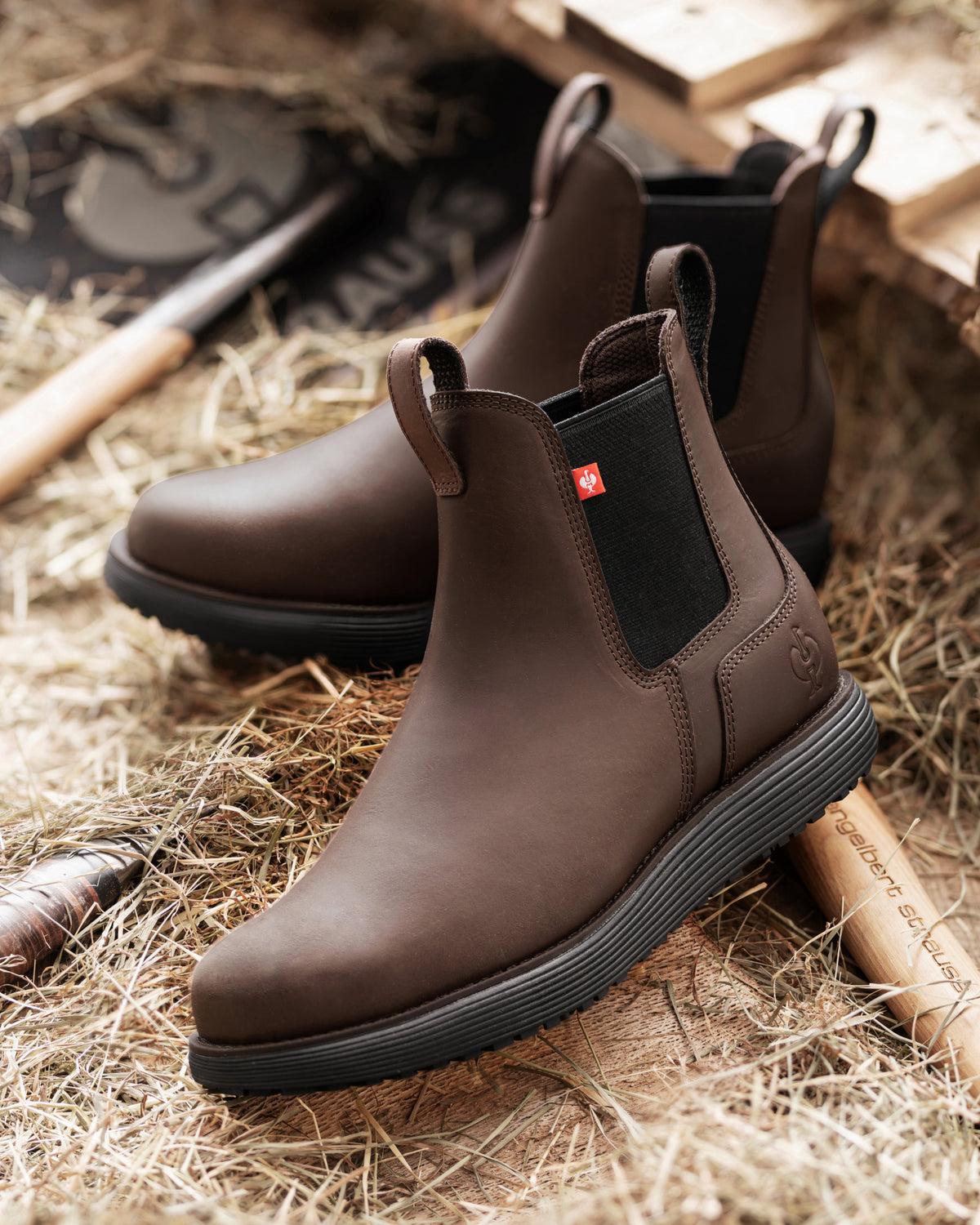 STRAUSS Amarillo 6-inch Soft Toe Chelsea Boot in Marsh brown shown in use on the job