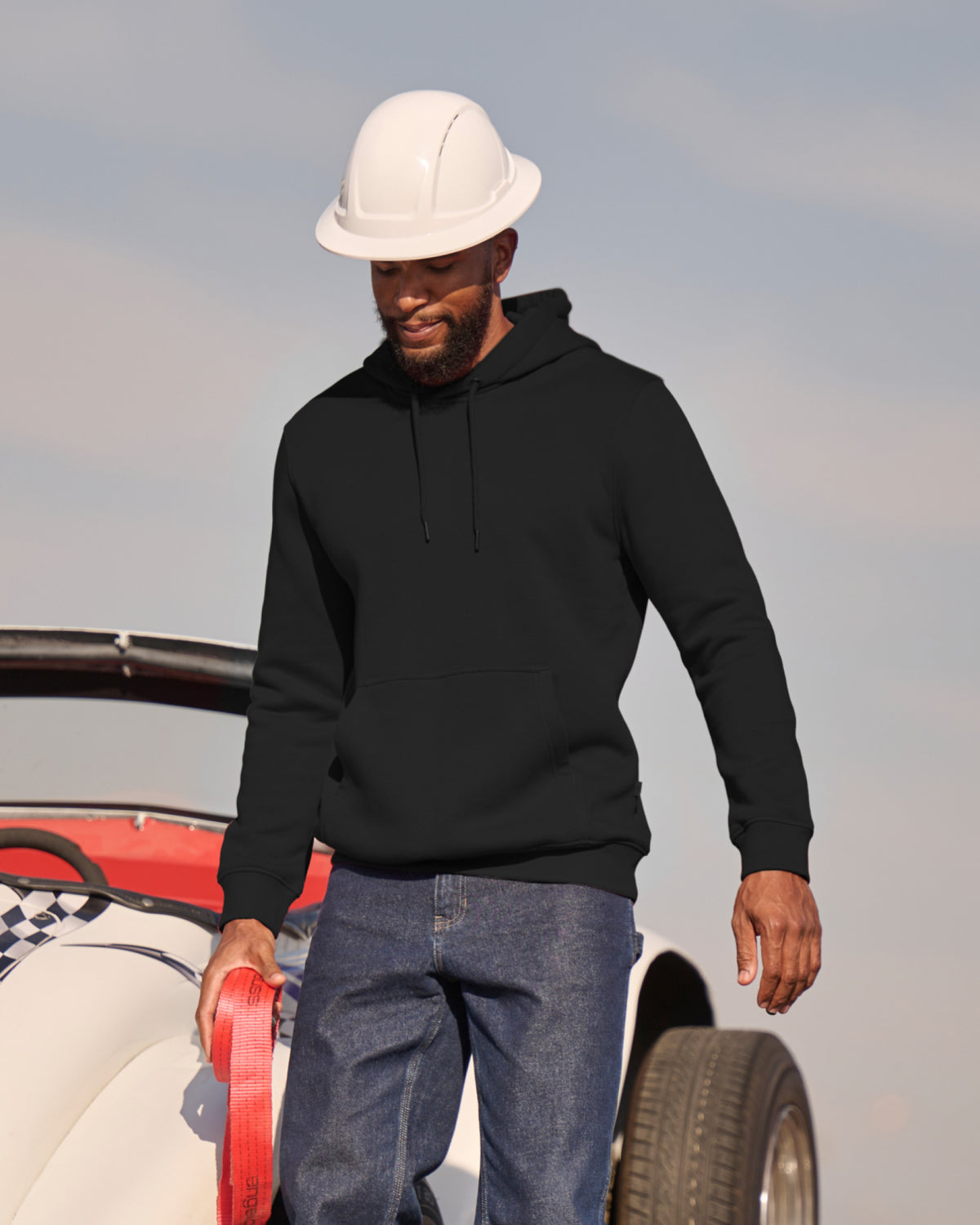 STRAUSS cotton-poly hoodie in black, worn in lifestyle setting