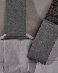 Close-up of the adjustable straps, clips, and stitching on the black STRAUSS e.s.taktik Y-back suspenders.
