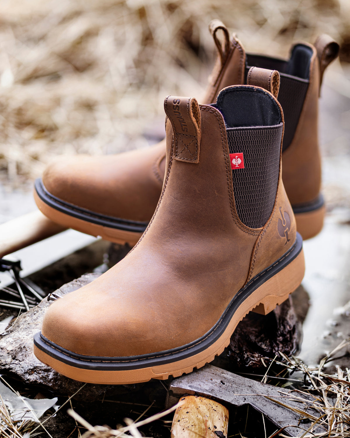 STRAUSS Woodford 6-inch Composite Toe Chelsea Boot in Carob brown with workwear in a jobsite scene