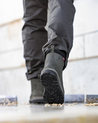 STRAUSS Woodside 6-inch Steel Toe Work Boot in Carbon gray worn in an outdoor work setting