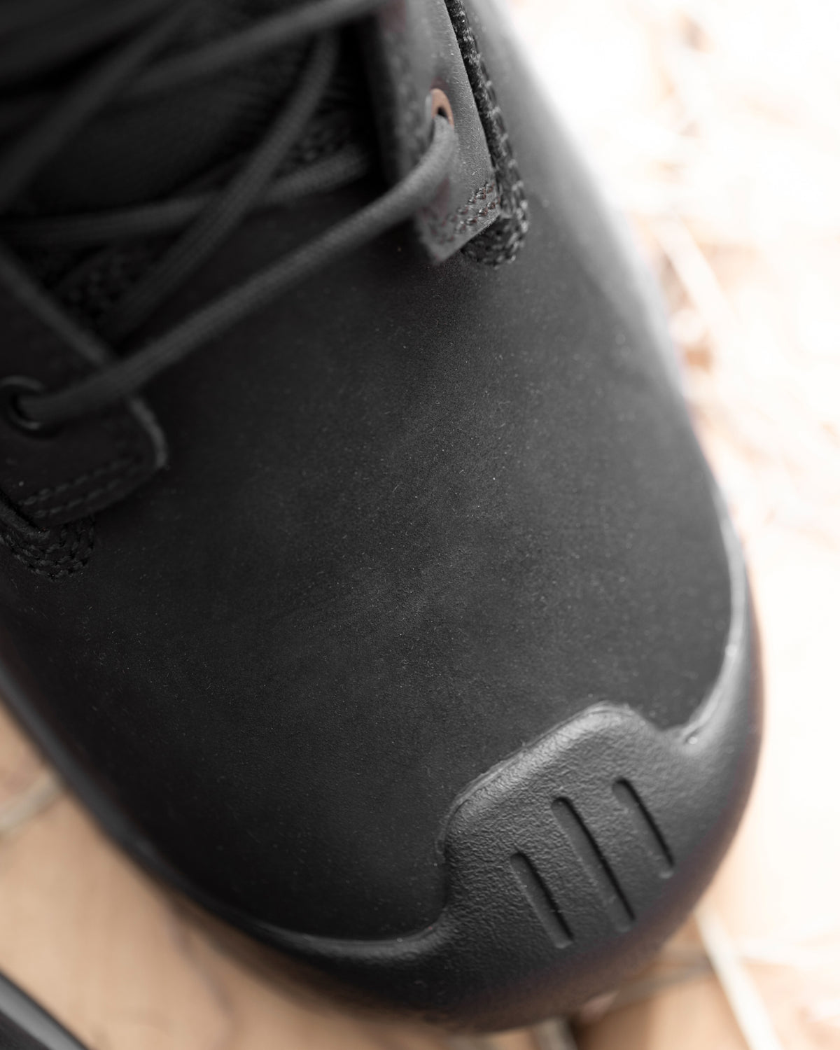 Close-up of the Black Queenstown 6-inch Steel Toe Work Boot steel toe area