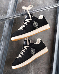 STRAUSS Tampa Steel Toe Work Shoe in Black and Light beige worn in an outdoor work setting