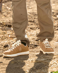 STRAUSS Tampa Steel Toe Work Shoe in Almond brown shown on rough jobsite ground