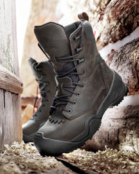 STRAUSS Edmonton 8-inch Steel Toe Work Boot in Brown shown on rough jobsite ground