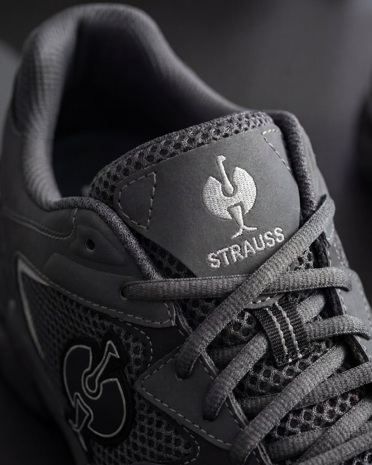 Close-up of the Carbon gray St. Louis Composite Toe Work Shoe upper and laces