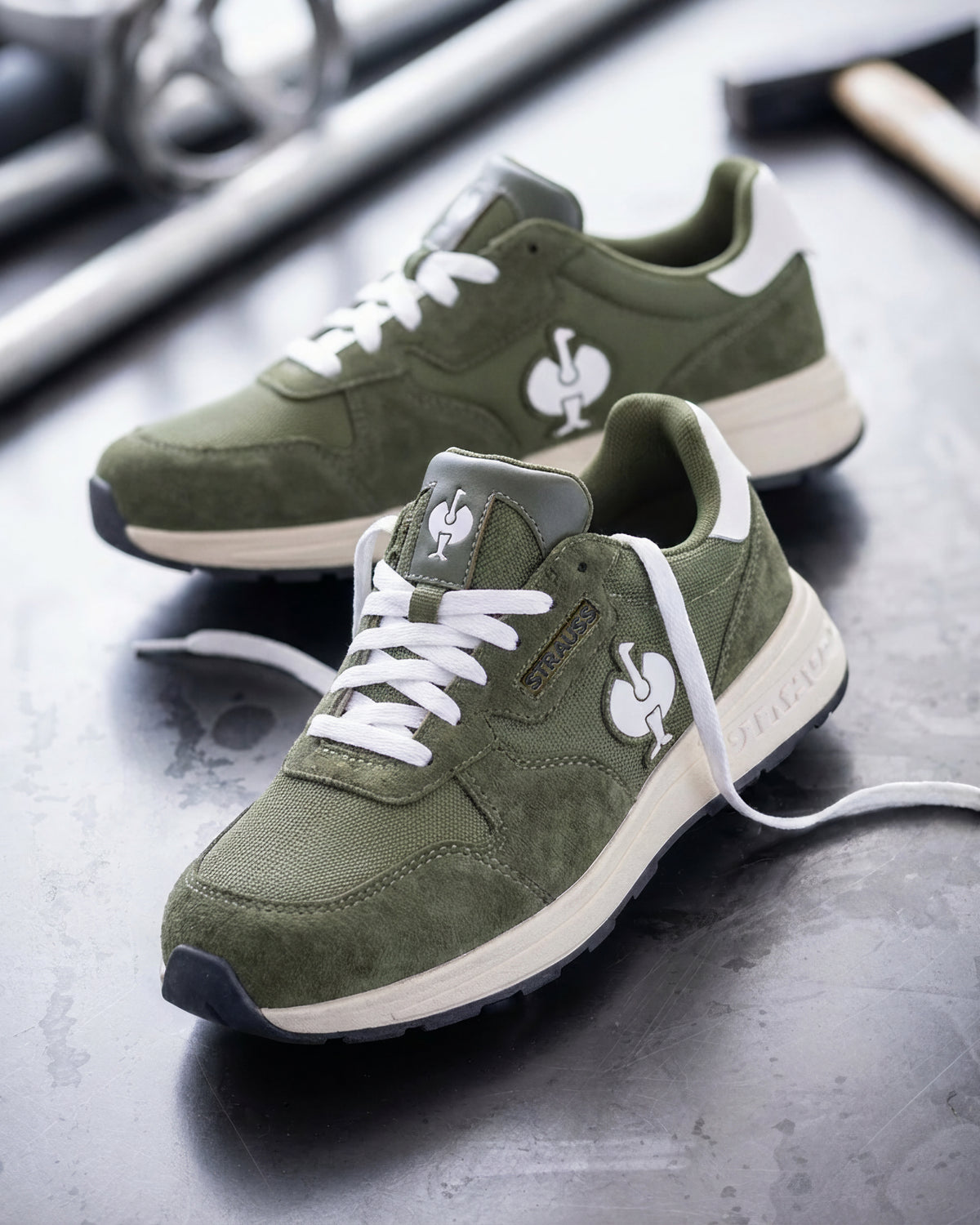 STRAUSS Canberra Steel Toe Work Shoe in Disguise green shown in use on the job
