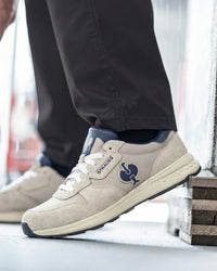 STRAUSS Canberra Steel Toe Work Shoe in Silver worn in an outdoor work setting