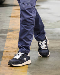 STRAUSS Canberra Steel Toe Work Shoe in Nero blue shown on rough jobsite ground